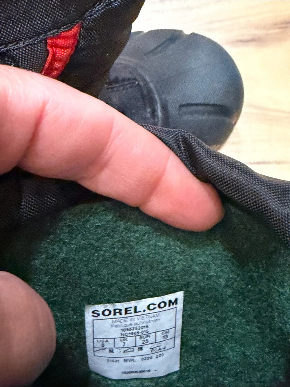 Sorel Kids Black Snow Boots with Red Accents